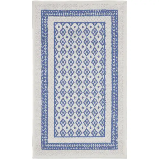 Ivory and Blue Geometric Distressed Area Rug Photo 2