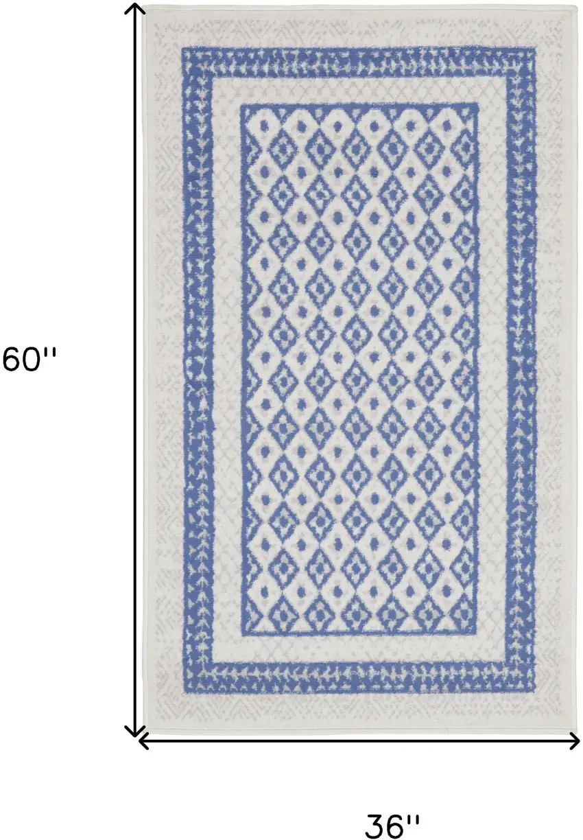 Ivory and Blue Geometric Distressed Area Rug Photo 3