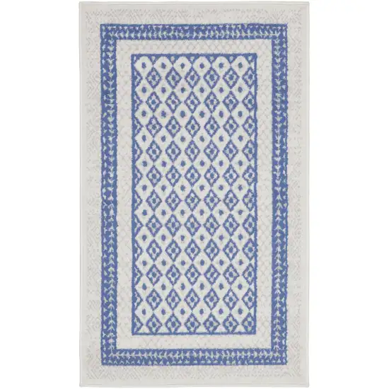 Ivory and Blue Geometric Distressed Area Rug Photo 1