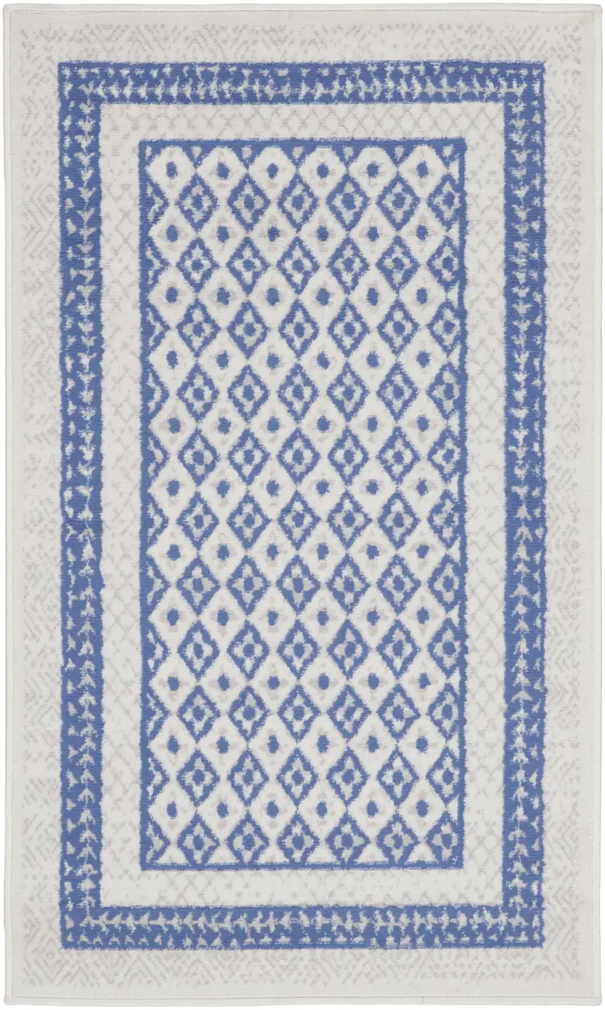 Ivory and Blue Geometric Distressed Area Rug Photo 1