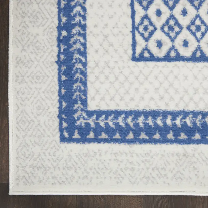 Ivory and Blue Geometric Distressed Area Rug Photo 9