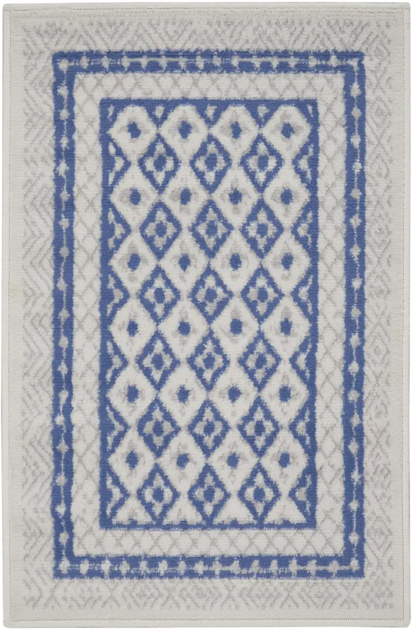 Ivory and Blue Geometric Distressed Area Rug Photo 1