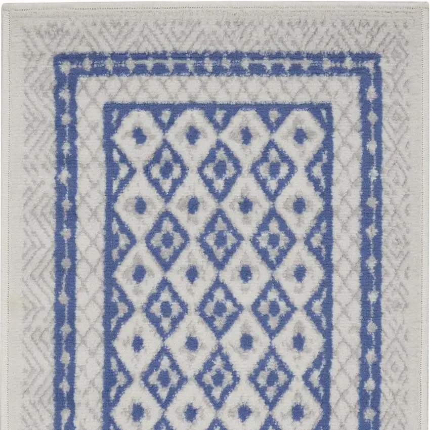 Ivory and Blue Geometric Distressed Area Rug Photo 3