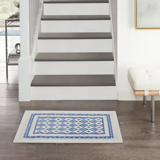 Ivory and Blue Geometric Distressed Area Rug Photo 5