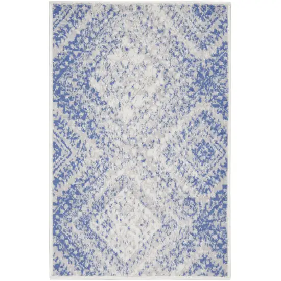 Ivory and Blue Geometric Distressed Area Rug Photo 1