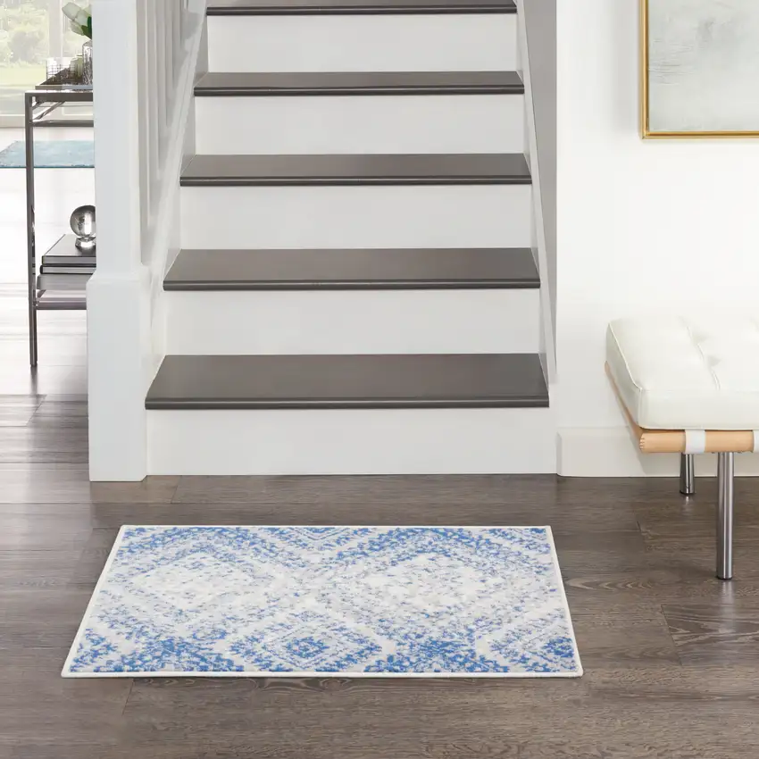 Ivory and Blue Geometric Distressed Area Rug Photo 3