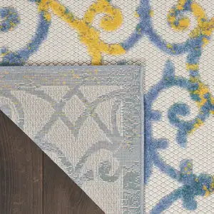 Photo of Ivory and Blue Indoor Outdoor Area Rug