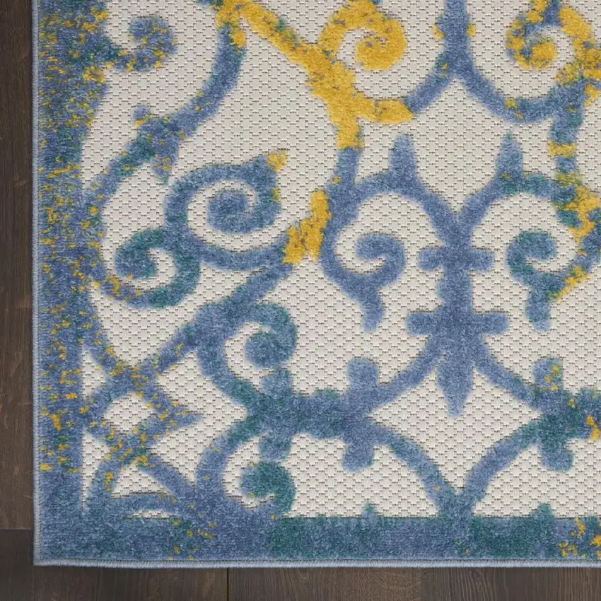 8' X 11' Ivory And Blue Indoor Outdoor Area Rug Photo 9