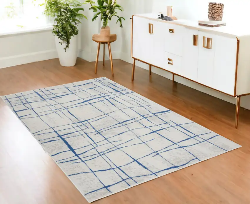Blue And Ivory Abstract Dhurrie Area Rug Photo 1