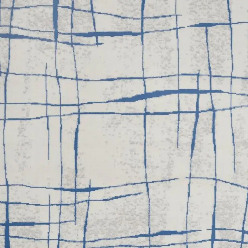 Ivory And Blue Geometric Distressed Area Rug Photo 1