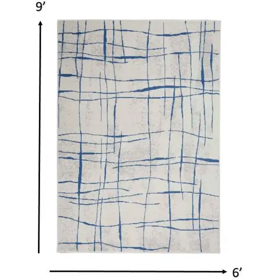Ivory and Blue Irregular Grids Area Rug Photo 1