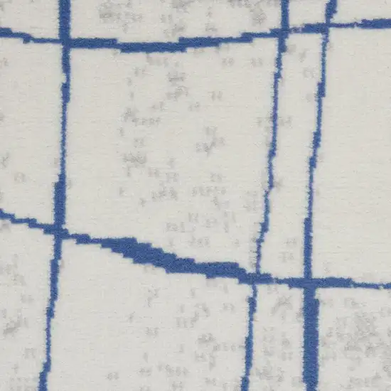 Ivory And Blue Geometric Distressed Area Rug Photo 3