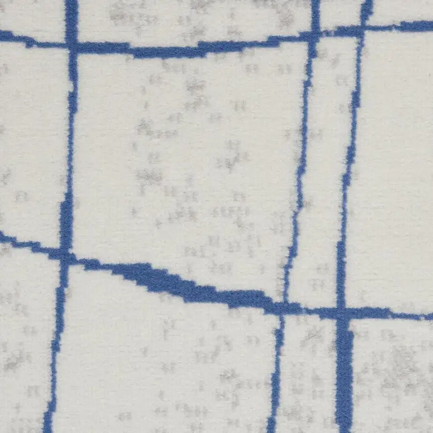 Ivory And Blue Geometric Distressed Area Rug Photo 3