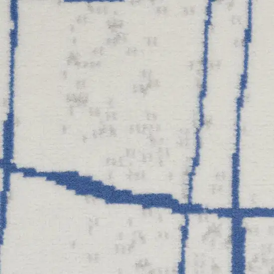 Ivory And Blue Geometric Distressed Area Rug Photo 1