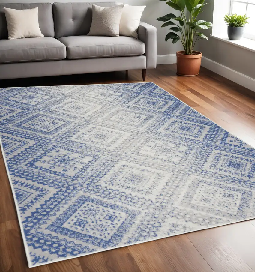 Ivory And Blue Geometric Area Rug Photo 2