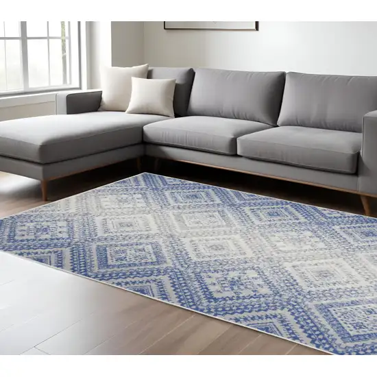 Ivory And Blue Geometric Area Rug Photo 2