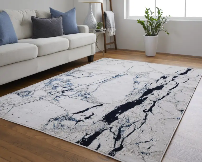 Ivory and Blue Marble Power Loom Distressed Area Rug Photo 6