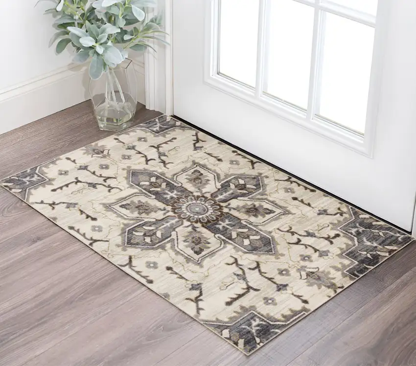 Ivory Gray and Black Floral Medallion Power Loom Area Rug Photo 1
