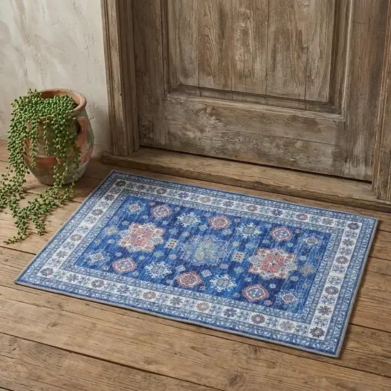 Ivory and Blue Oriental Distressed Non Skid Area Rug Photo 1