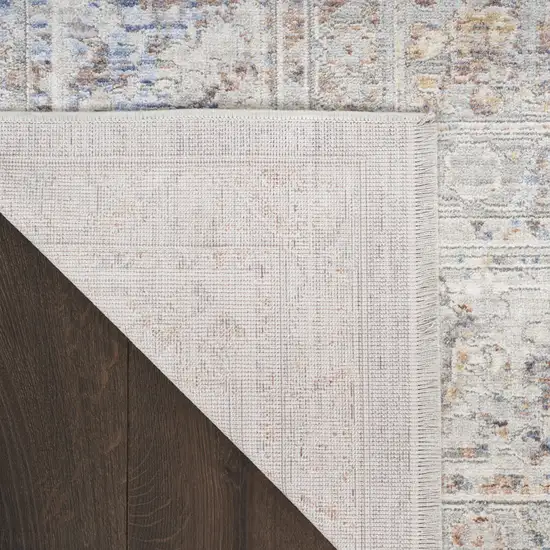 Ivory and Blue Oriental Power Loom Distressed Area Rug With Fringe Photo 7