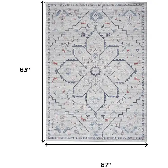 5' X 7' Ivory and Blue Oriental Power Loom Washable Area Rug Photo 3