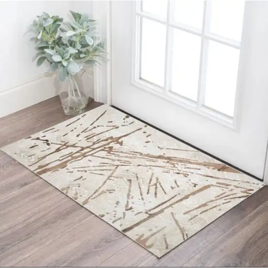 Ivory and Brown Abstract Area Rug Photo 1