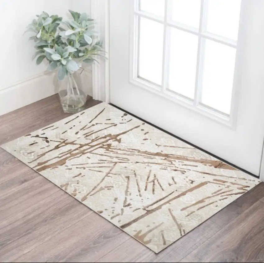 Ivory and Brown Abstract Area Rug Photo 1