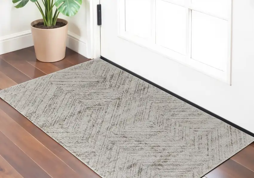 Ivory and Brown Geometric Power Loom Area Rug Photo 1