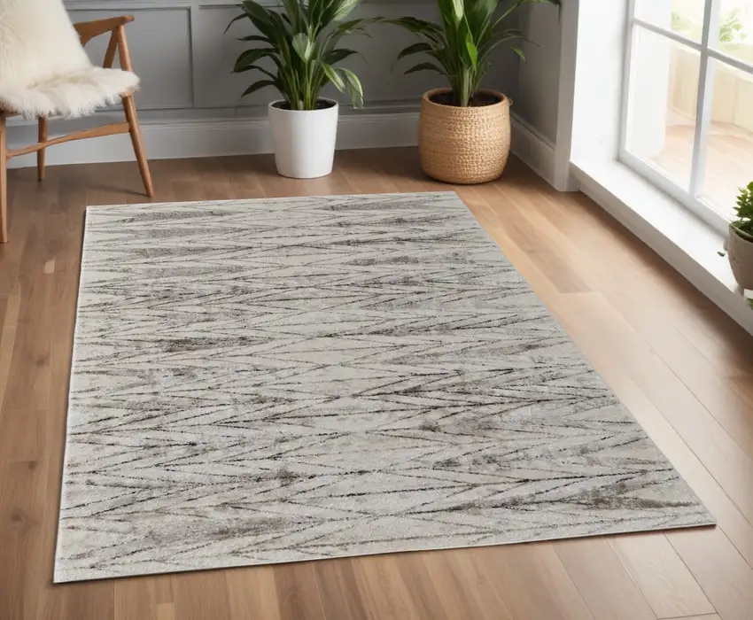Ivory and Brown Geometric Power Loom Area Rug Photo 1