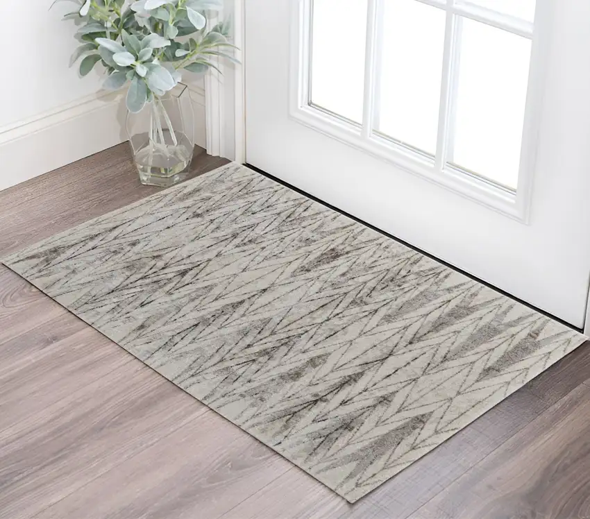 Ivory and Brown Geometric Power Loom Area Rug Photo 1