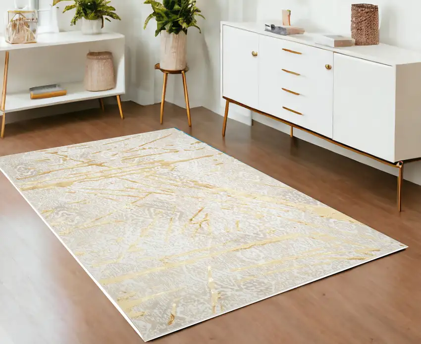 Ivory and Gold Abstract Area Rug Photo 2