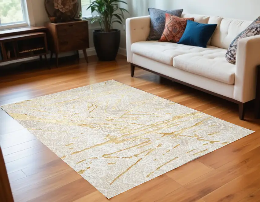 Ivory and Gold Abstract Area Rug Photo 2