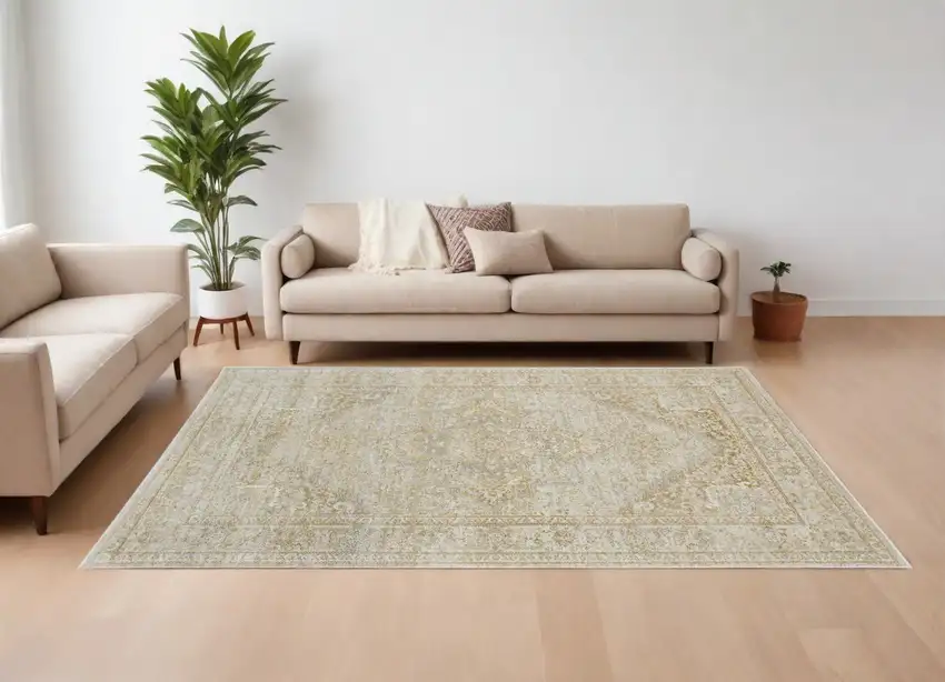Ivory and Gold Oriental Power Loom Area Rug Photo 1