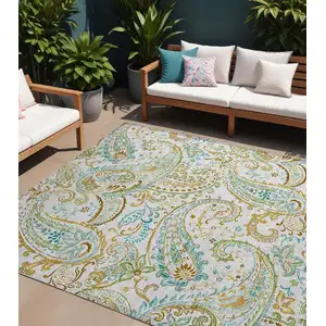 Photo of Ivory and Gold Paisley Washable Non Skid Indoor Outdoor Area Rug