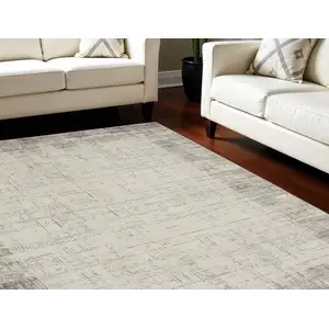 Photo of Ivory and Gray Abstract Area Rug