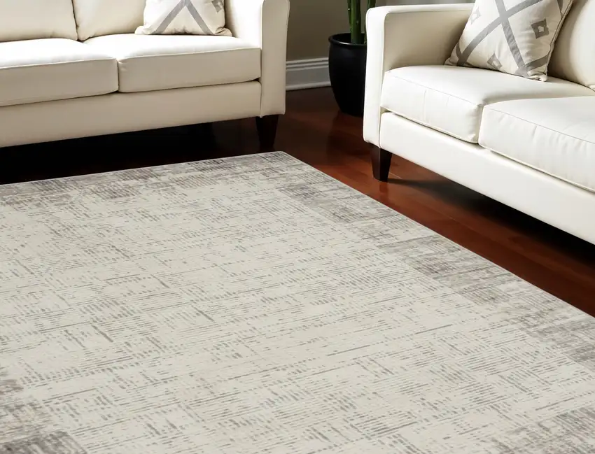 Ivory and Gray Abstract Area Rug Photo 1