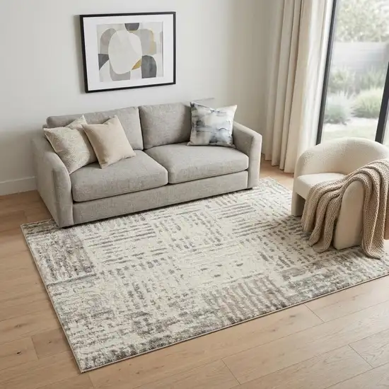 Ivory and Gray Abstract Area Rug Photo 1