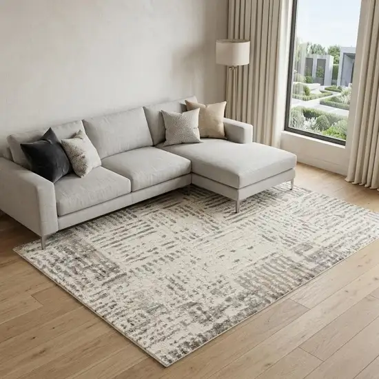 Ivory and Gray Abstract Area Rug Photo 1