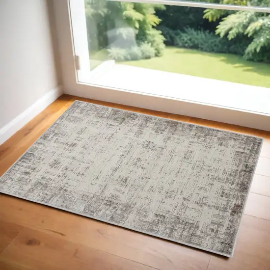 Ivory and Gray Abstract Area Rug Photo 1