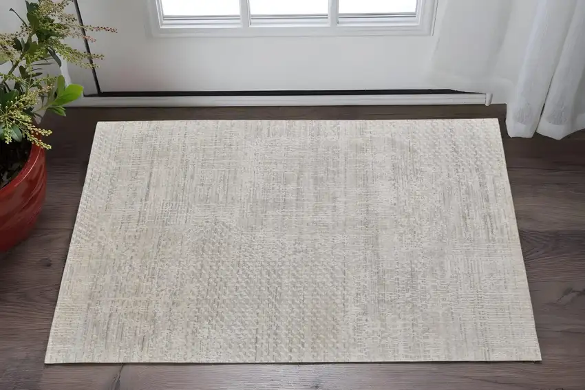 Ivory and Gray Abstract Hand Woven Worn Faded Area Rug Photo 1