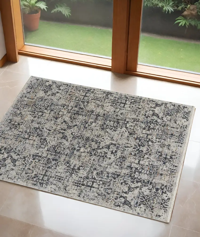 Ivory and Gray Abstract Power Loom Worn Faded Area Rug With Fringe Photo 1