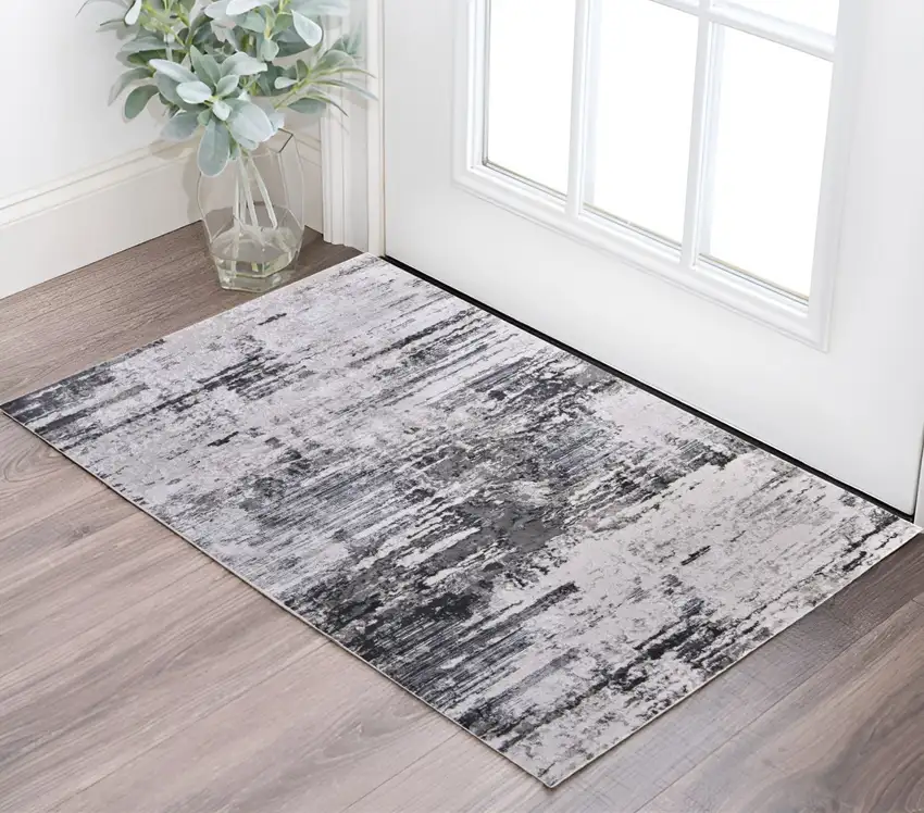 Ivory and Gray Abstract Power Loom Worn Faded Area Rug Photo 1
