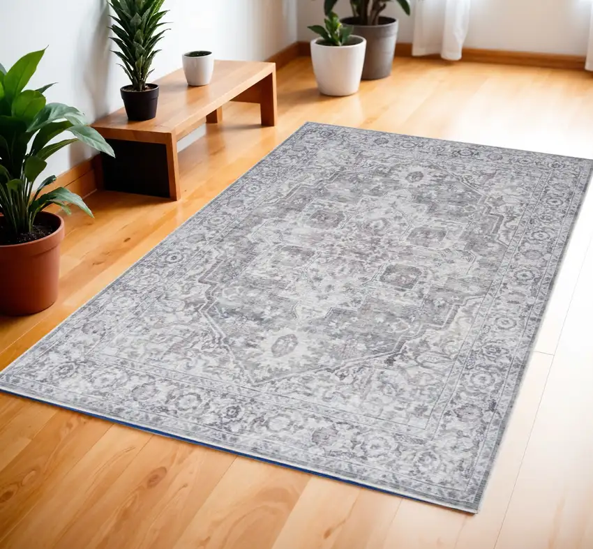 Ivory and Gray Floral Medallion Power Loom Distressed Area Rug Photo 1