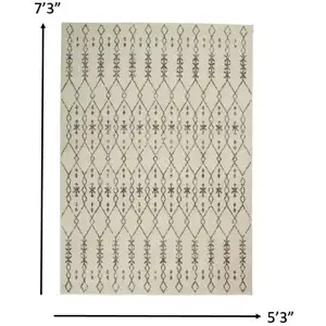 Photo of Ivory and Gray Geometric Area Rug