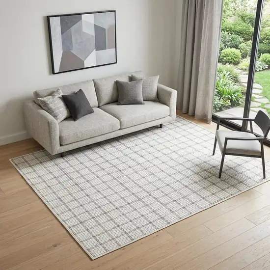 5' X 7' Ivory and Gray Geometric Power Loom Washable Non Skid Area Rug Photo 1