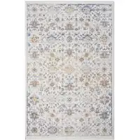 Photo of Ivory and Gray Oriental Power Loom Distressed Area Rug With Fringe