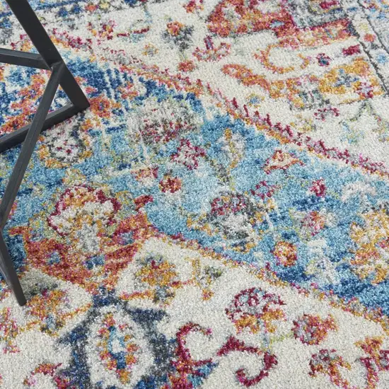 Ivory And Blue Oriental Distressed Area Rug Photo 9