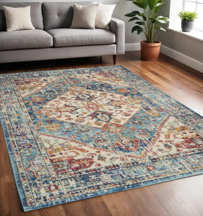 Ivory And Blue Oriental Distressed Area Rug Photo 1