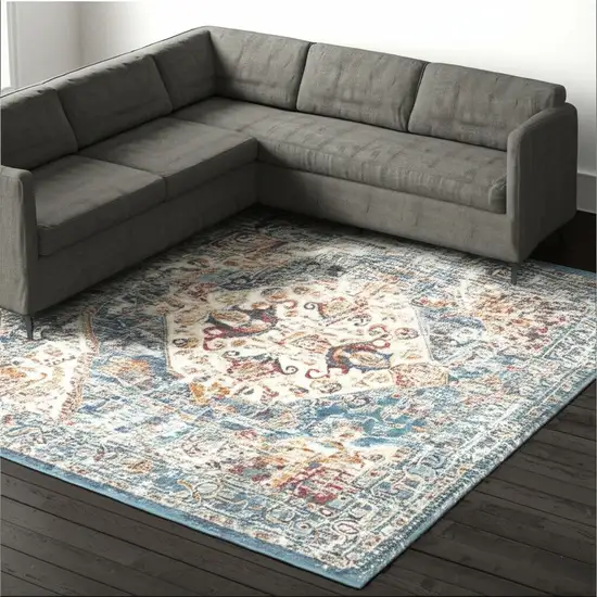 Ivory And Blue Oriental Distressed Area Rug Photo 1