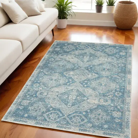 Ivory and Light Blue Medallion Distressed Area Rug Photo 1